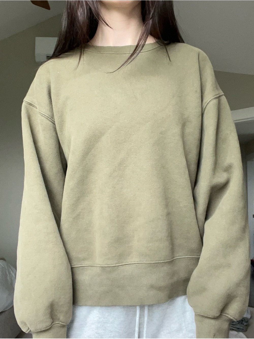 Olive green TNA sweatshirt